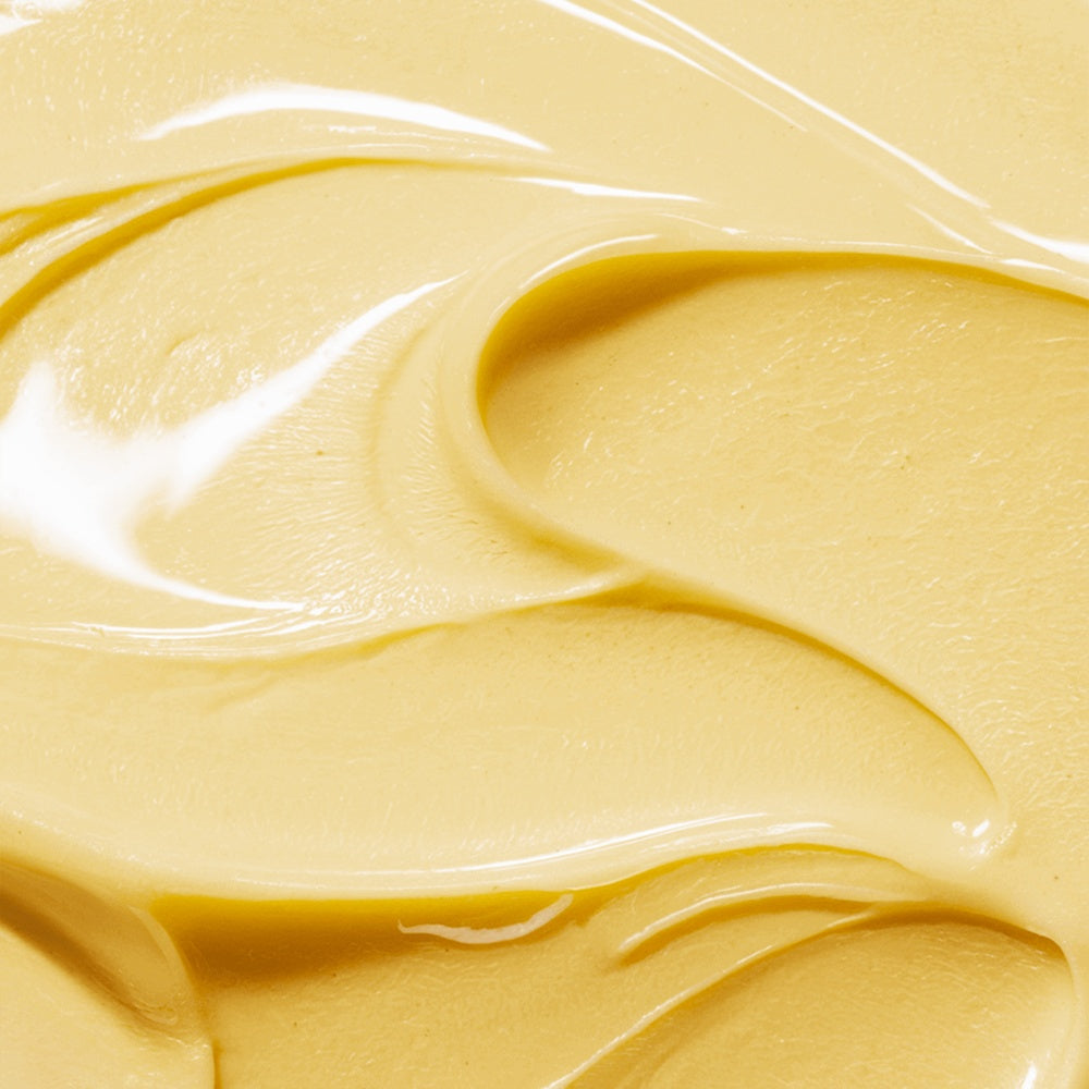 Close-up of Solar Daylight Balm, a hydrating sun balm for face with a creamy texture