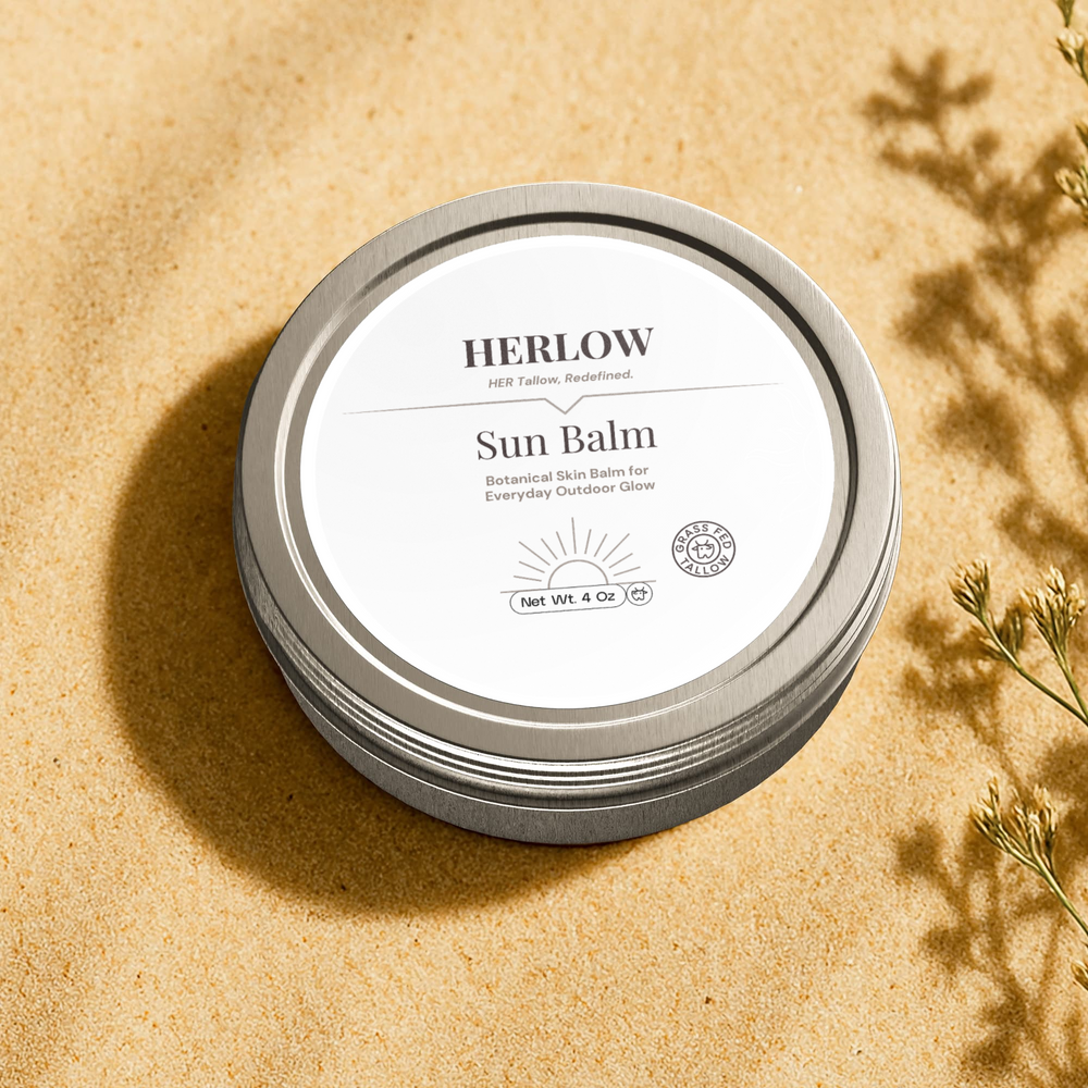 Hydrating Sun Balm for Face in a silver tin on sandy background for outdoor use