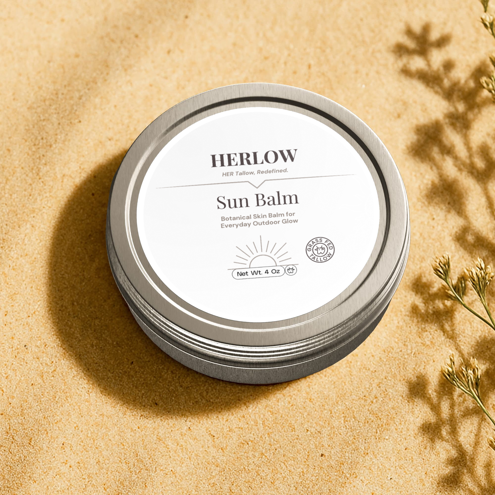 Hydrating Sun Balm for Face in a silver tin on sandy background for outdoor use