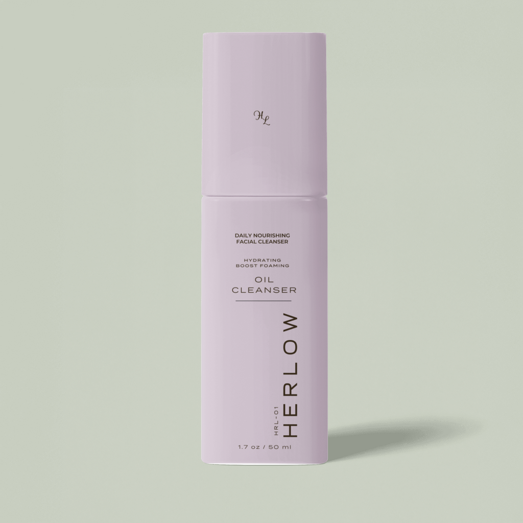HERLOW Milky Oil Foaming Cleanser in a sleek purple bottle for daily nourishing facial care