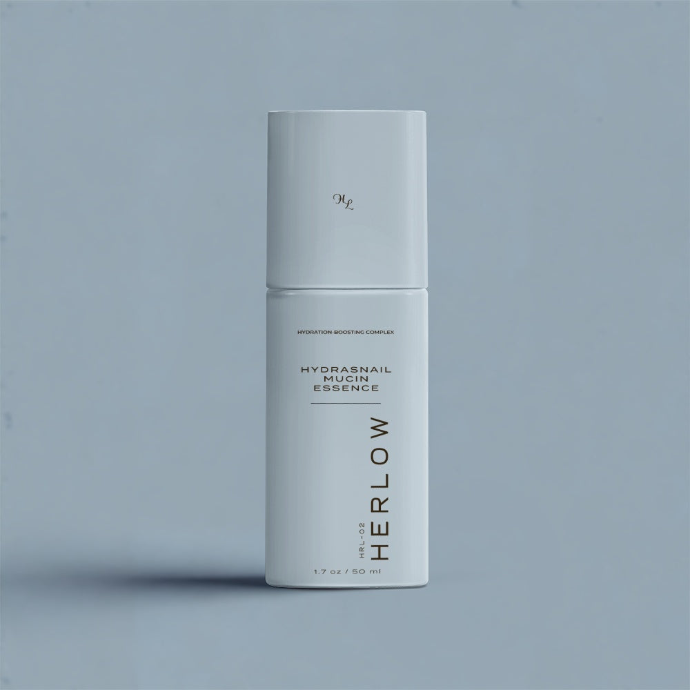 HERLOW Hydrasnai Snail Mucin Essence for face in a sleek white bottle with pump dispenser
