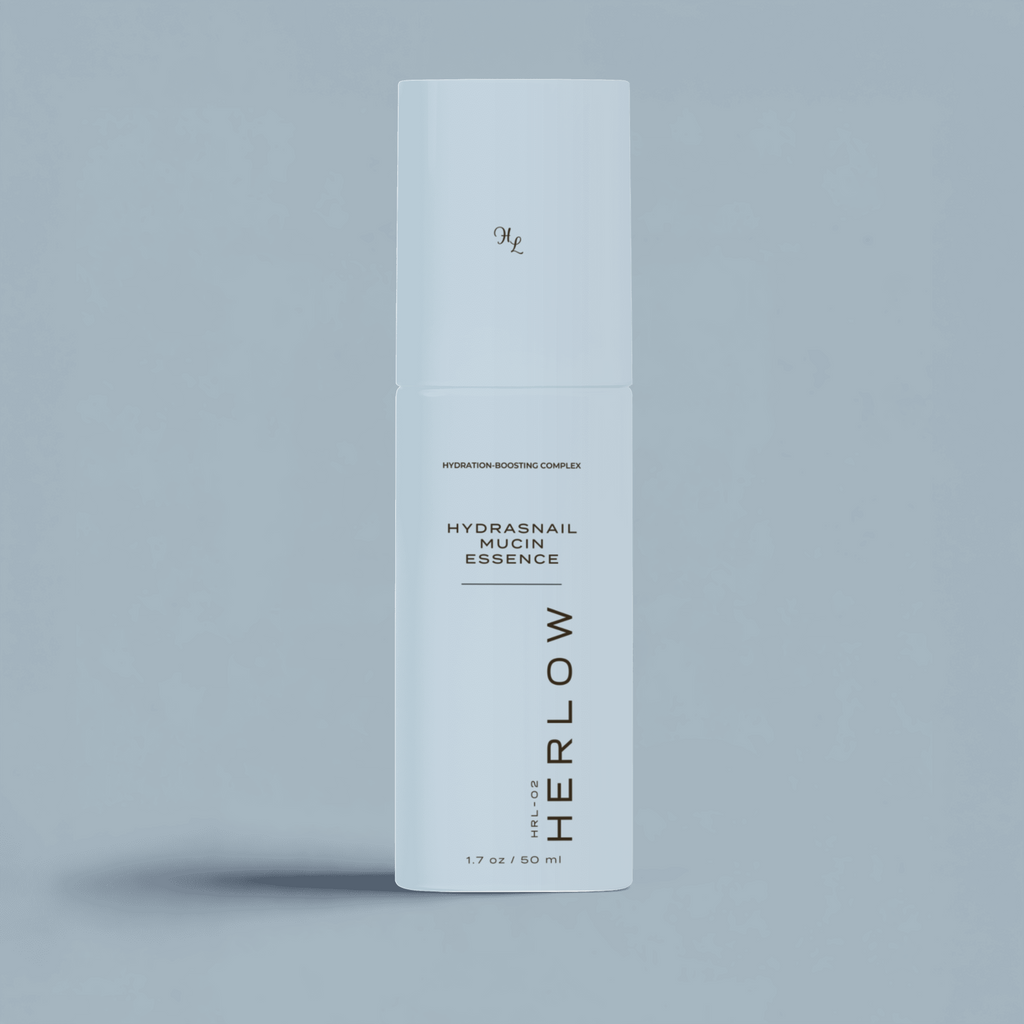 Hydrasnail Mucin Essence for Face by HERLOW in a sleek white bottle for hydrated, glowing skin